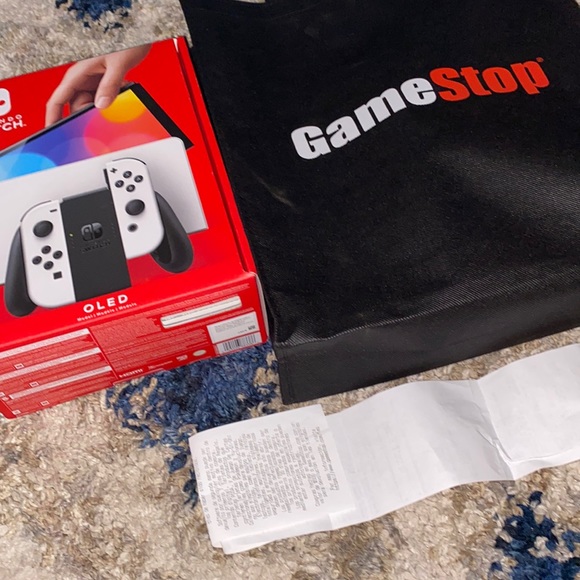 Nintendo switch oled GameStop bag and receipt proof of purchase